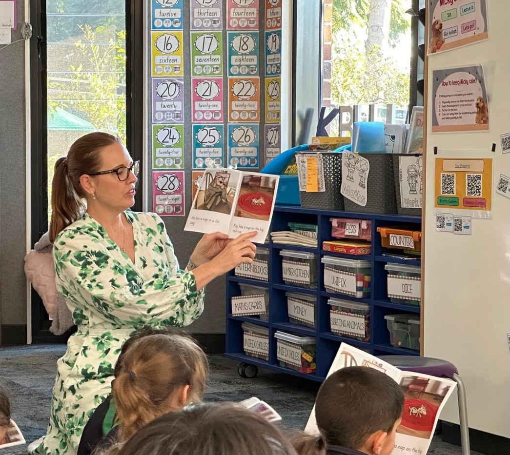Julie Scali modelling a reading lesson with a decodable reader in a primary classroom